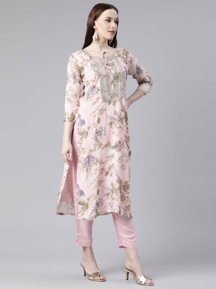 Neerus Orange printed kurta set with trouser and dupatta - back view