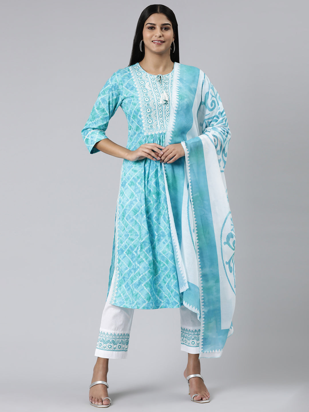 Neerus Green cotton printed kurta set with trouser and dupatta - front view