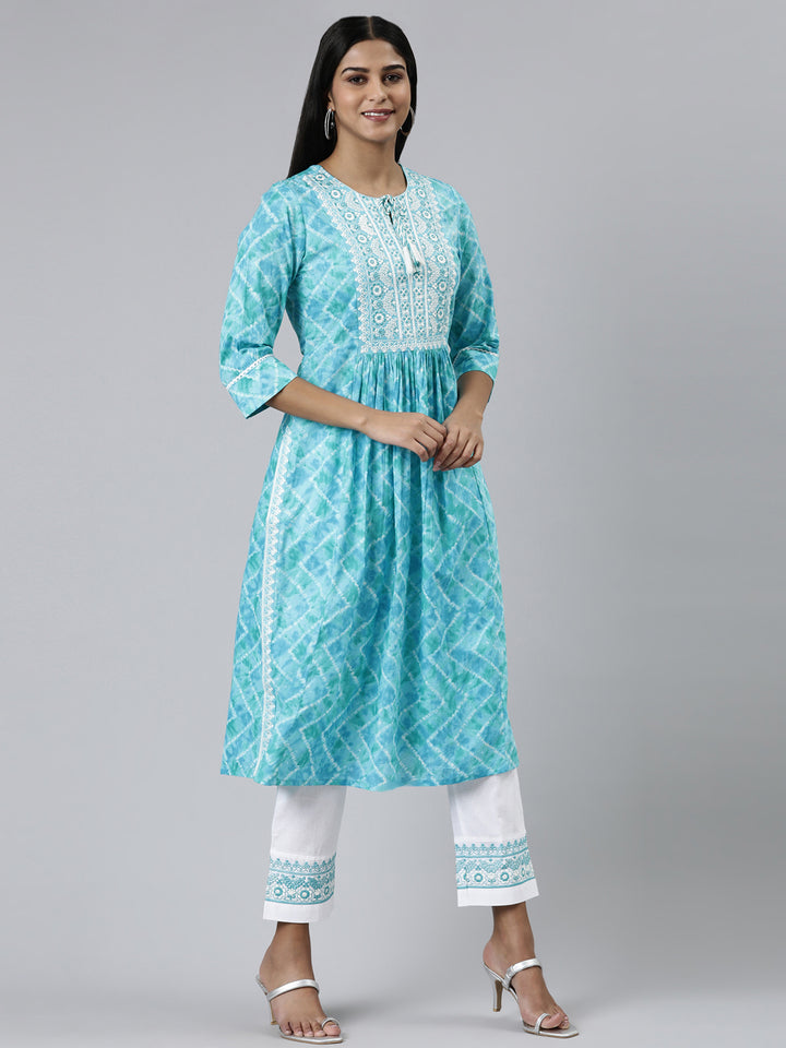 Neerus Green cotton printed kurta set with trouser and dupatta - back view