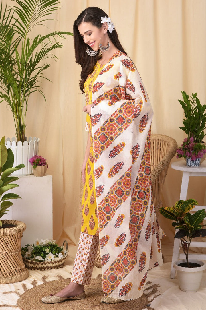 Neerus Yellow cotton kurta set with dupatta - side view